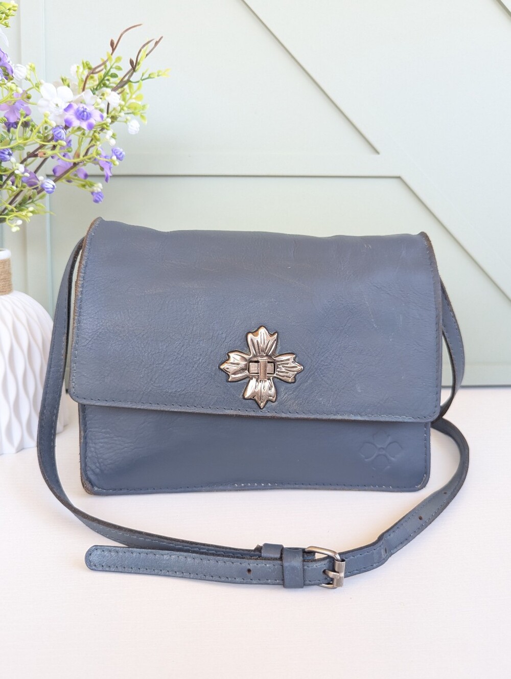 Patricia Nash Slate Blue Leather Crossbody with Floral Metal Clasp